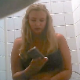 A hidden camera in an Eastern-European student restroom records 2 different girls shitting while sitting on a toilet. Audio is somewhat muffled, but some farting, plopping and pissing sounds can still be heard. About 3 minutes.